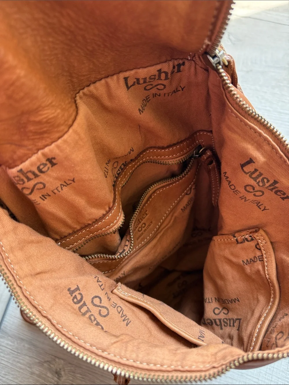 Lusher Stylish Tan Leather Backpack with Brass Accents